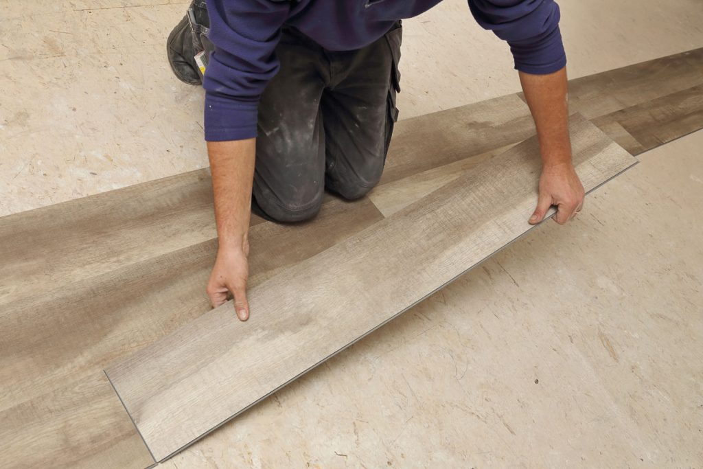 Laying flooring.