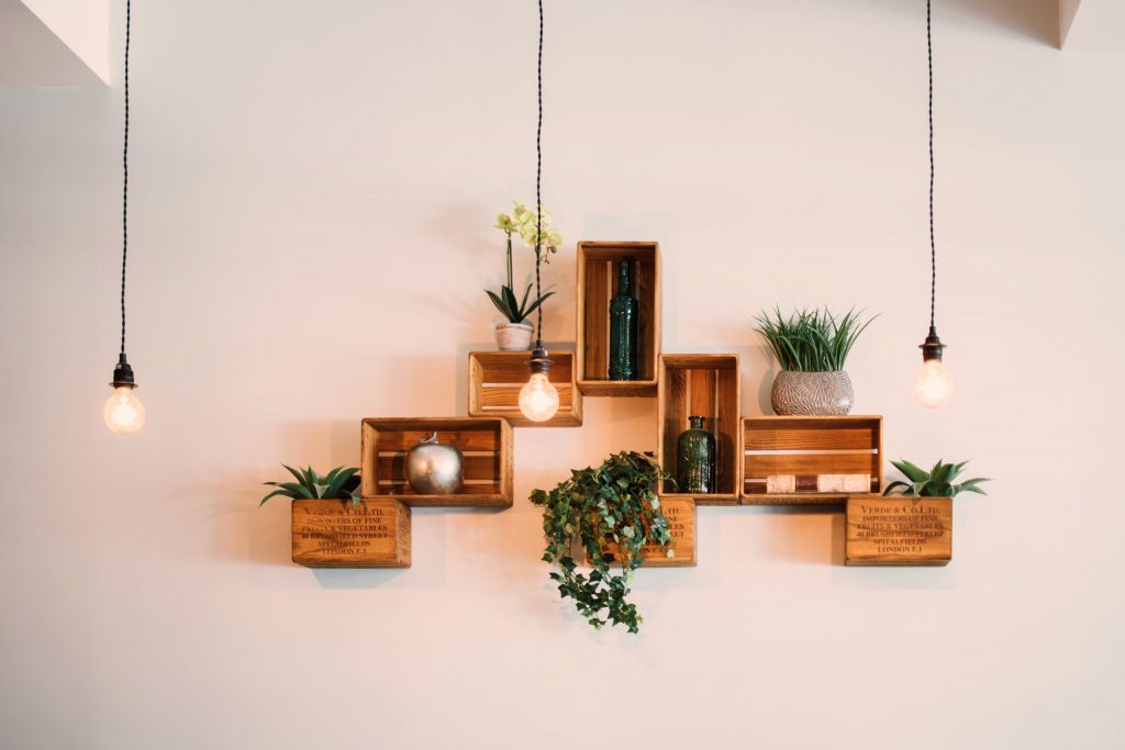 Image of multiple wooden boxes hanging on wall