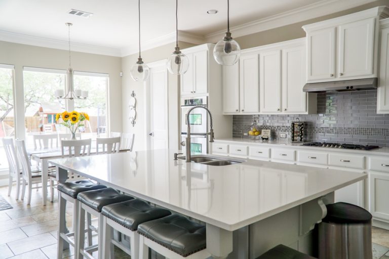 Renovated kitchen with pendant hanging lights